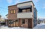 Experience modern living in this stunning multi-story home, perfect for a snowy retreat.