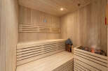 Experience ultimate relaxation in this beautifully crafted wooden sauna.