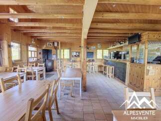 Discover this charming rustic interior, perfect for a cozy restaurant or bar.