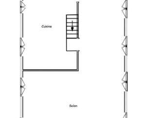 This is a floor plan of a ground floor property, featuring a spacious living room and a separate kitchen.