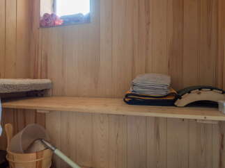Experience ultimate relaxation in this beautifully crafted wooden sauna.