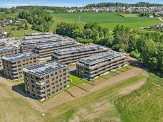 Discover modern living in this new construction development, featuring multiple apartment buildings with sleek, contemporary architecture.