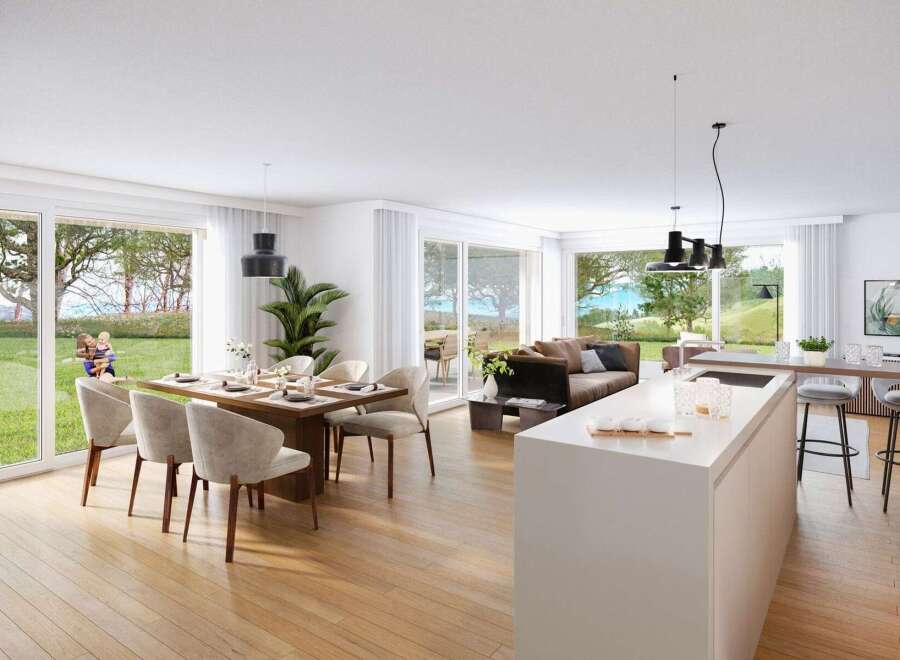 Experience modern living in this open-concept home, featuring a spacious dining area, a comfortable living room, and a sleek kitchen island.