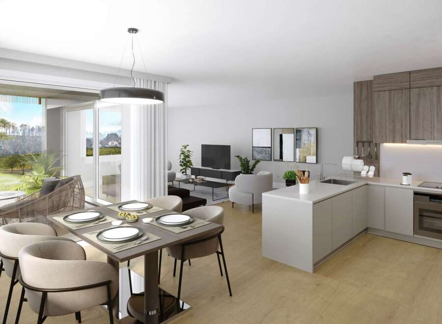Experience modern living in this open-concept apartment featuring a stylish dining area, a comfortable living room, and a sleek, fully-equipped kitchen.