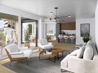 Experience modern living in this open-concept condo, featuring a sleek kitchen with a breakfast bar and a spacious living area.