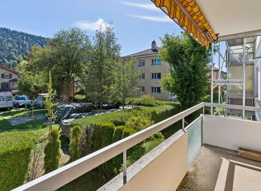 Enjoy the fresh air and scenic views from this charming balcony, perfect for morning coffee or evening relaxation.