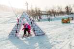 Experience the joy of winter sports with this charming ski slope designed for young adventurers.