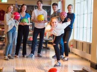 Experience the thrill of a bowling alley, perfect for family fun and entertainment.