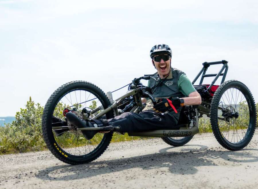 Experience the thrill of off-road adventure with this specialized handcycle, perfect for exploring rugged terrains.
