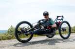 Experience the thrill of off-road adventure with this specialized handcycle, perfect for exploring rugged terrains.