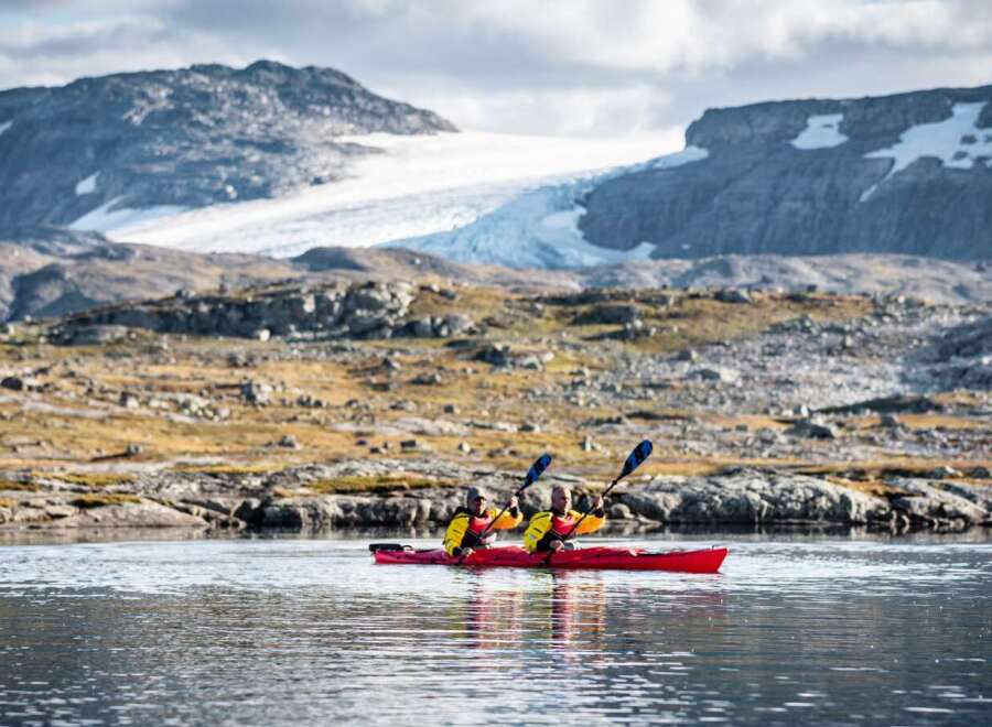 Experience the ultimate adventure with a kayaking trip through breathtaking glacial landscapes.