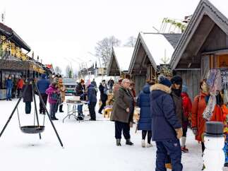 Experience the charm of a winter market in Geilo, Norway, with this vibrant scene.