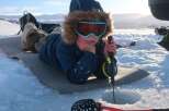 Experience the thrill of ice fishing in this picturesque winter wonderland.