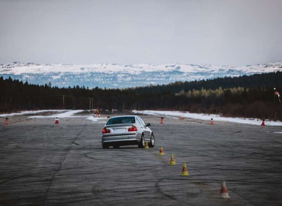 Experience the thrill of driving on this expansive asphalt track, perfect for performance driving events or personal practice.