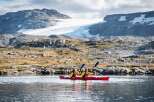 Experience the ultimate adventure with a kayaking trip through breathtaking glacial landscapes.