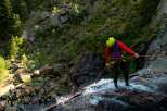 Experience the thrill of rappelling down a stunning waterfall in this breathtaking natural landscape.