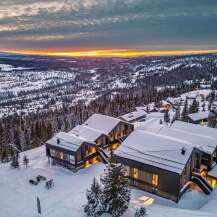 Experience luxury mountain living in this stunning ski-in/ski-out property, perfectly situated amidst a winter wonderland.