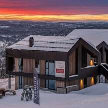 Experience luxury mountain living in this stunning modern chalet, perfectly situated amidst a breathtaking winter landscape.