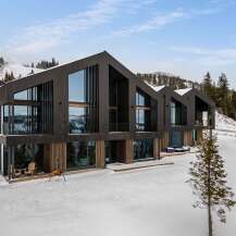 Experience modern luxury in this stunning ski-in/ski-out mountain retreat.