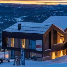 Experience luxury mountain living in this stunning modern apartment, perfect for an open house viewing.