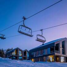 Experience luxury mountain living with this stunning ski-in/ski-out property, featuring modern architecture and panoramic views.