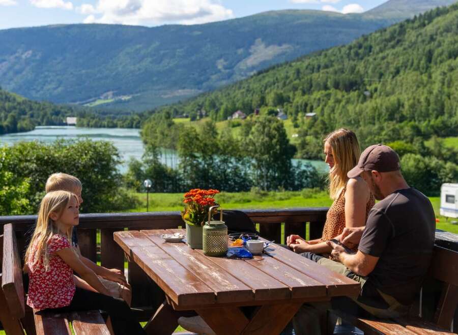Enjoy breathtaking mountain and lake views from this charming property's deck.