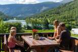 Enjoy breathtaking mountain and lake views from this charming property's deck.