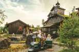 Experience the charm of this unique property, featuring rustic wooden architecture with living green roofs that blend seamlessly with the natural surroundings.
