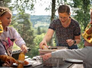 Enjoy a delightful family picnic amidst stunning natural scenery, perfect for creating lasting memories.