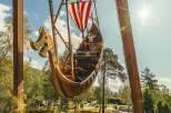 Experience the thrill of this Viking-themed amusement park ride, designed to resemble a traditional longship.