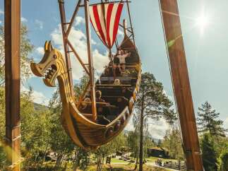 Experience the thrill of this Viking-themed amusement park ride, designed to resemble a traditional longship.