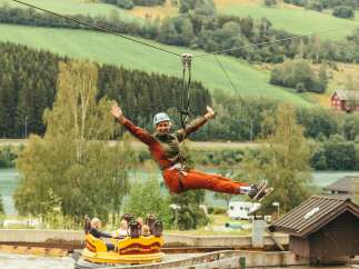 Experience the thrill of a lifetime with this exhilarating zipline adventure set against a stunning natural backdrop.