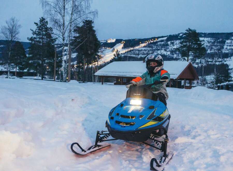 Experience the thrill of winter with this unique property offering direct access to snowmobile trails.