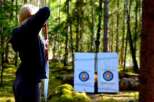 Experience the thrill of archery in a serene forest setting.
