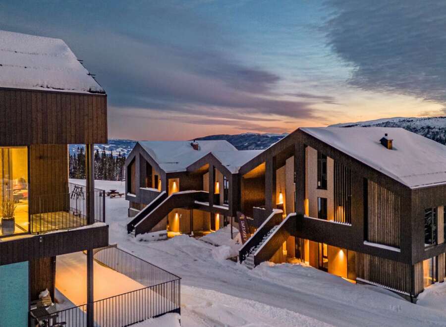 Experience modern luxury in this stunning ski-in/ski-out mountain retreat, featuring contemporary architecture and breathtaking panoramic views.