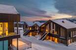 Experience modern luxury in this stunning ski-in/ski-out mountain retreat, featuring contemporary architecture and breathtaking panoramic views.