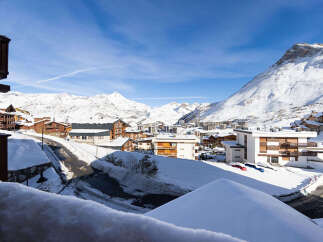 Experience the charm of a winter wonderland with this stunning mountain village property.