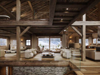 Experience luxury mountain living in this stunning chalet, featuring a spacious open-plan living area with a cozy fireplace and breathtaking panoramic views of the snowy landscape.