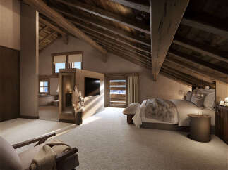 Experience ultimate comfort in this luxurious attic bedroom, featuring a plush king-size bed with a cozy fur throw and a stunning view of the snowy landscape through the large window.