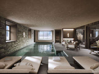 Experience ultimate relaxation in this luxurious indoor spa featuring a serene swimming pool with stunning mountain views.