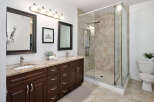 Experience luxury in this stunning bathroom featuring a spacious walk-in shower with elegant tilework.