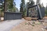 Discover this stunning A-frame home nestled among tall pine trees.
