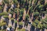 Discover this charming property nestled amongst mature trees, offering a serene and private retreat.
