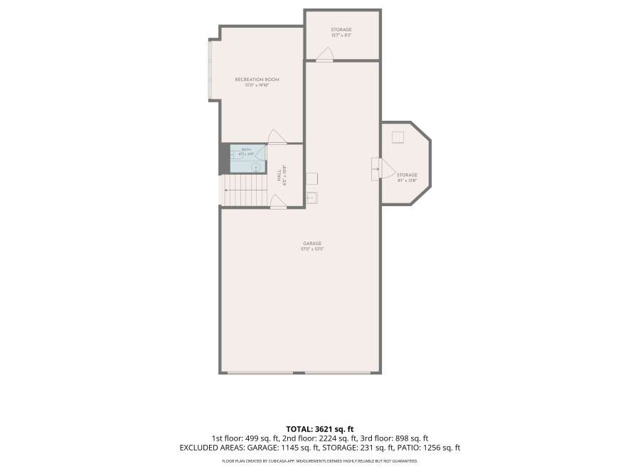 Discover ample space in this expansive property, featuring a large recreation room perfect for entertainment and a convenient hall area.