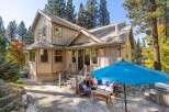 Enjoy outdoor living with this charming home featuring a spacious stone patio, perfect for entertaining.