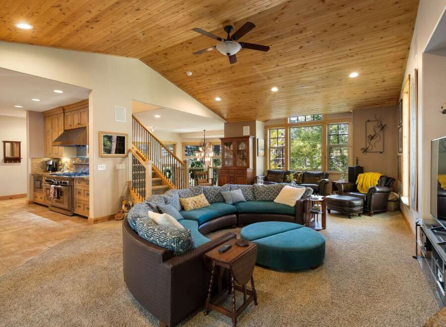Experience luxurious living in this spacious open-concept home, featuring a gourmet kitchen with custom cabinetry and a large island perfect for entertaining.