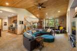 Experience luxurious living in this spacious open-concept home, featuring a gourmet kitchen with custom cabinetry and a large island perfect for entertaining.