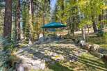 Enjoy the serene outdoors with this charming patio area, perfect for relaxation and entertaining.