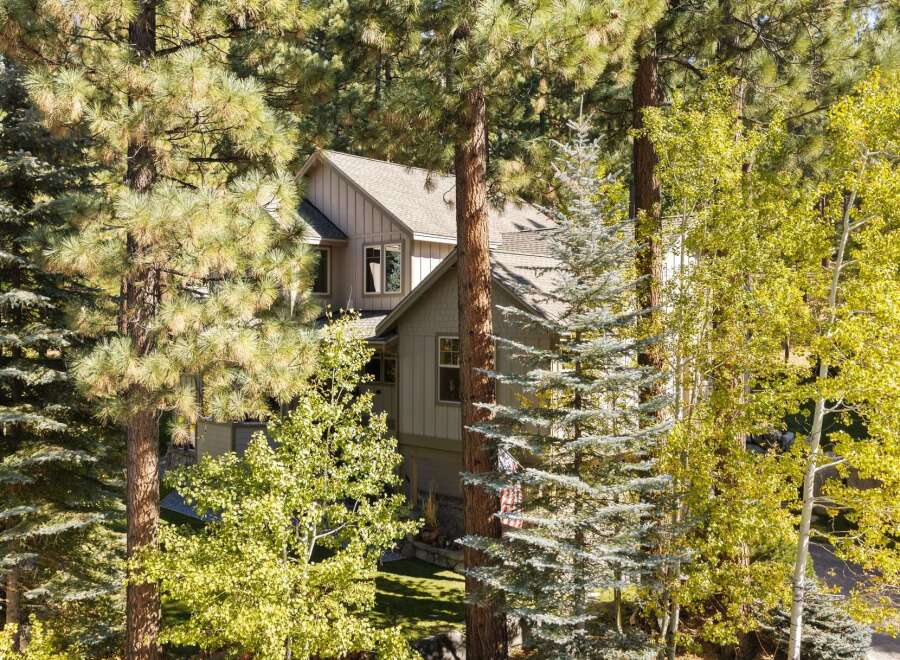 Nestled amongst mature pine and aspen trees, this stunning home offers a serene mountain retreat.