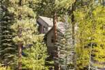 Nestled amongst mature pine and aspen trees, this stunning home offers a serene mountain retreat.